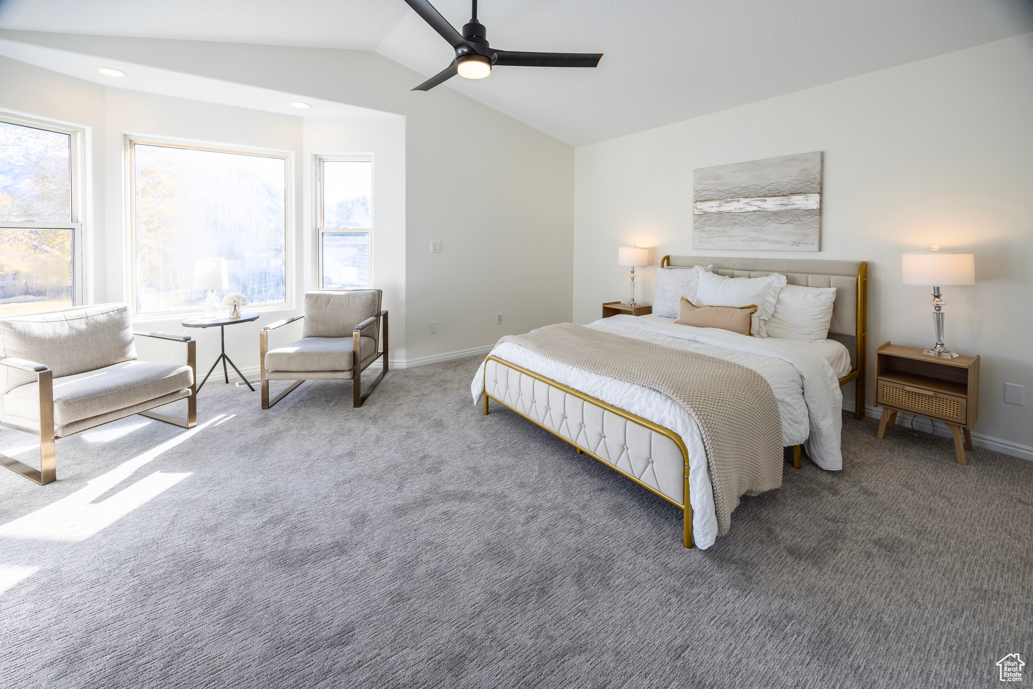 Carpeted bedroom with lofted ceiling, recessed lighting, a ceiling fan, and baseboards