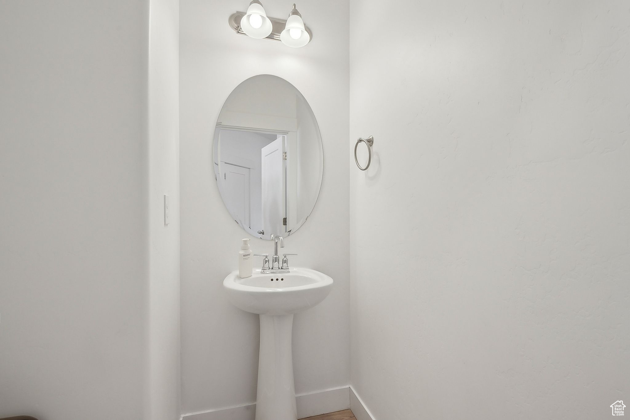 Bathroom featuring baseboards