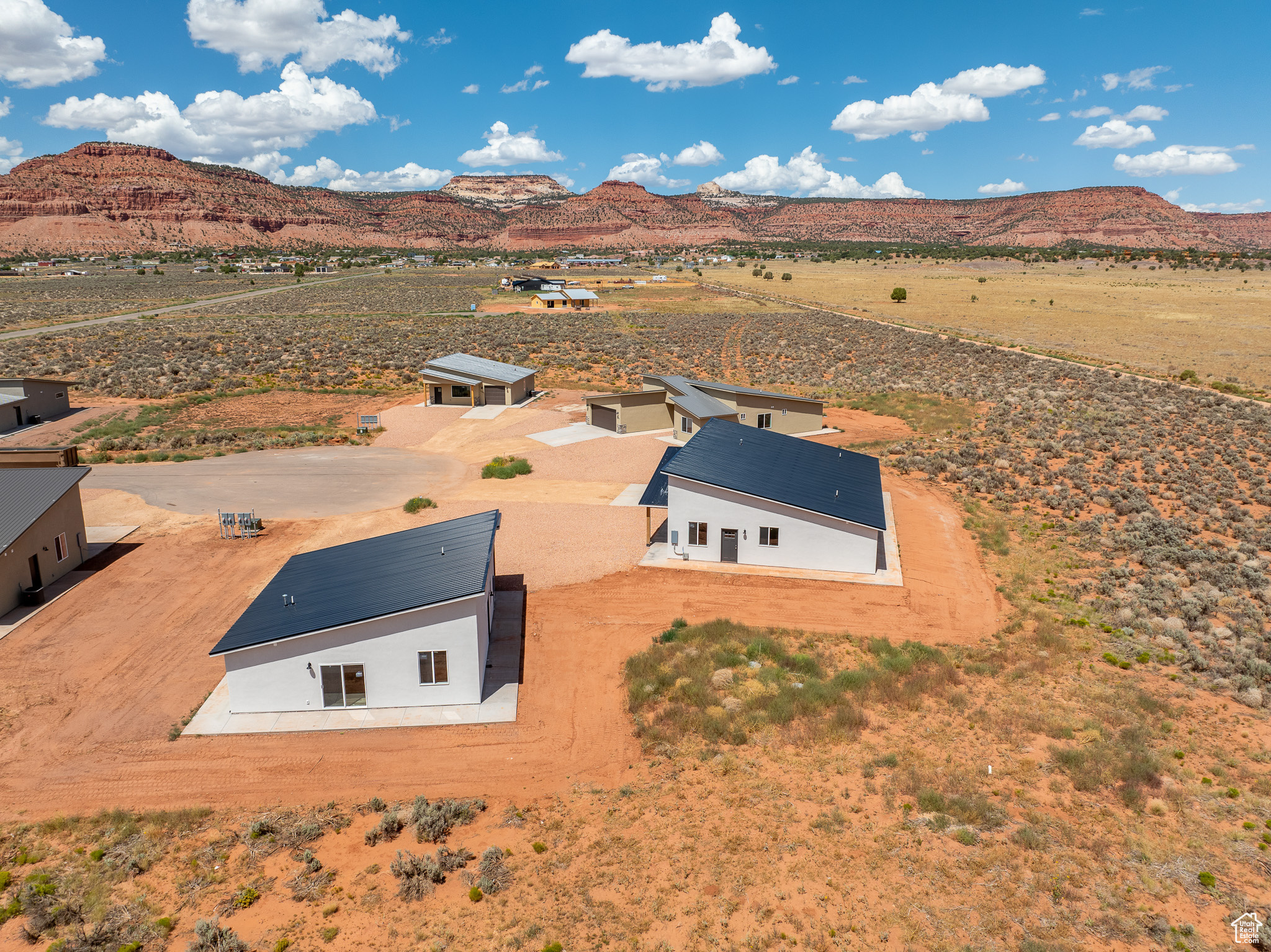 Birds eye view of property with a mountain view