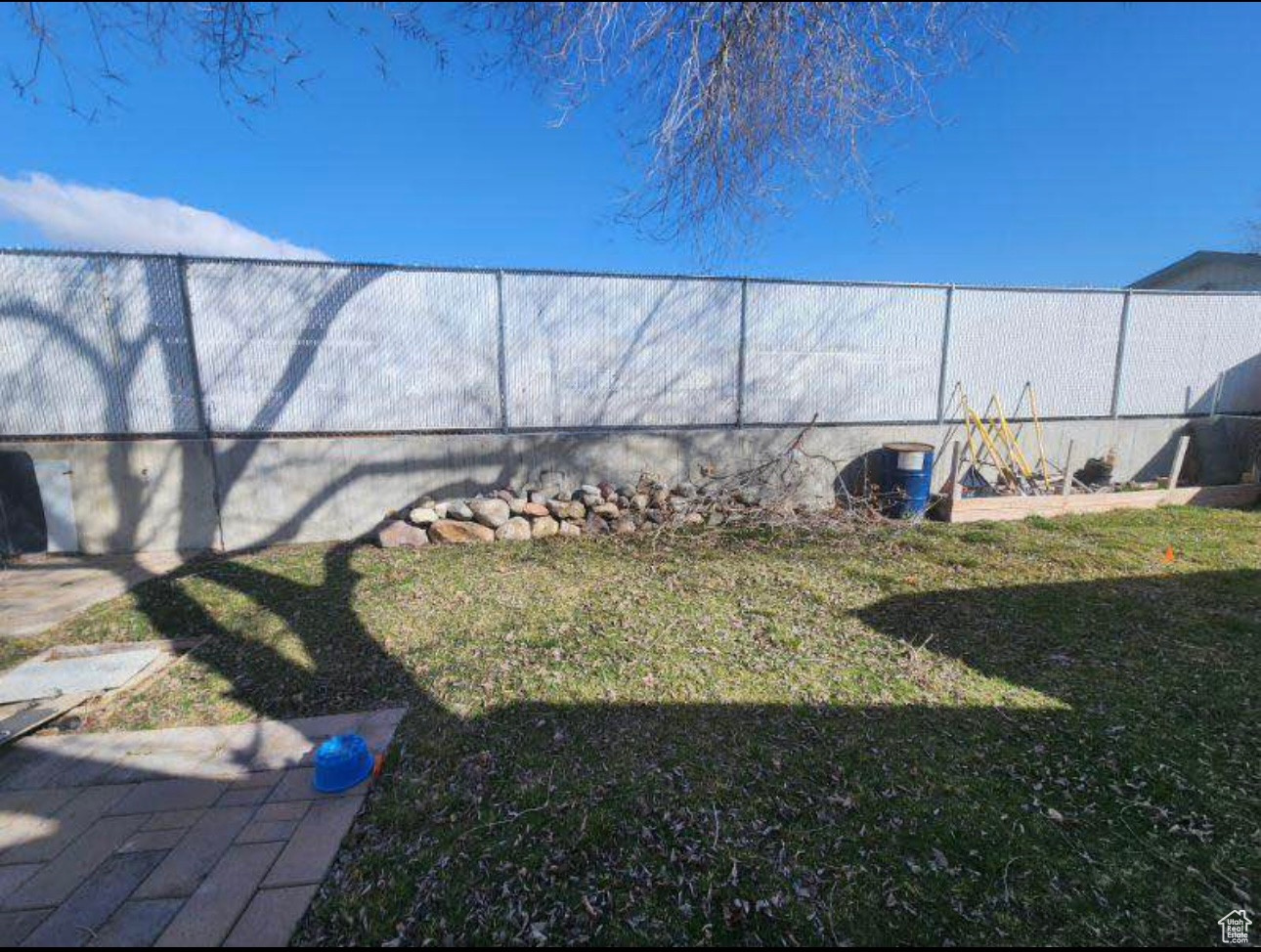 View of yard featuring fence