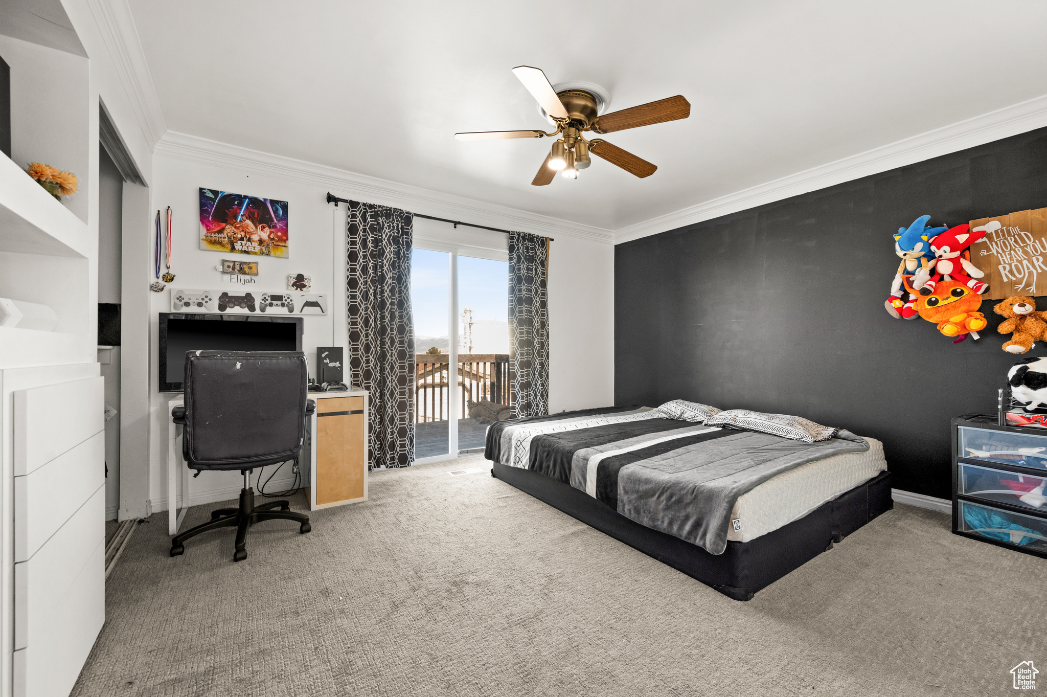 Bedroom with ceiling fan, access to exterior, light colored carpet, and ornamental molding