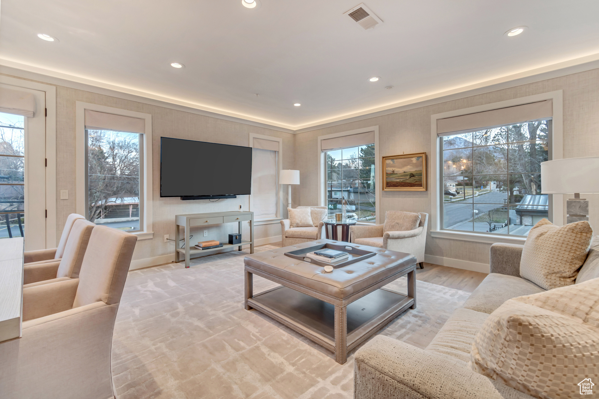 Living room featuring plenty of natural light, recessed lighting, and visible vents