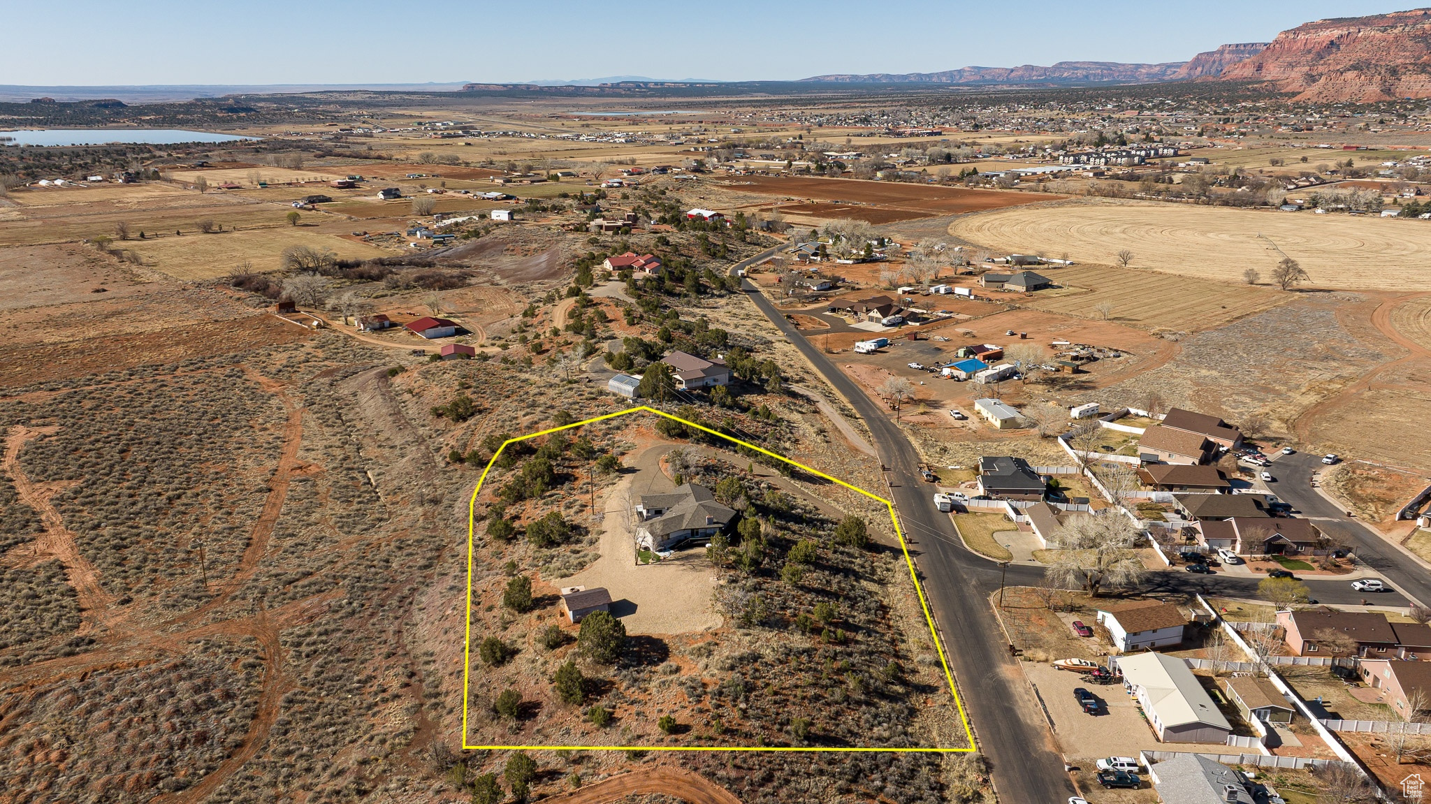 Birds eye view of property with a mountain view