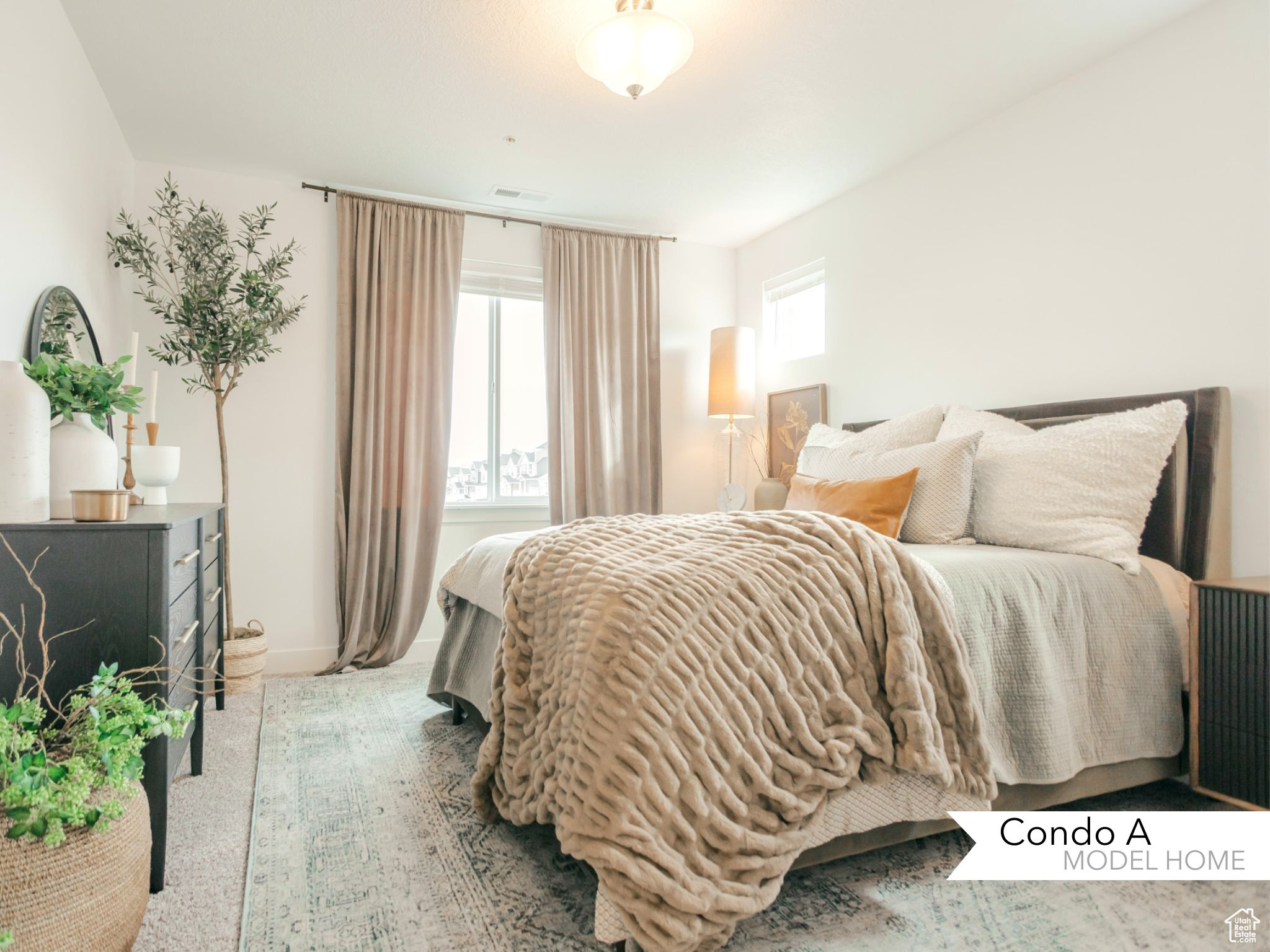 Bedroom featuring visible vents and baseboards