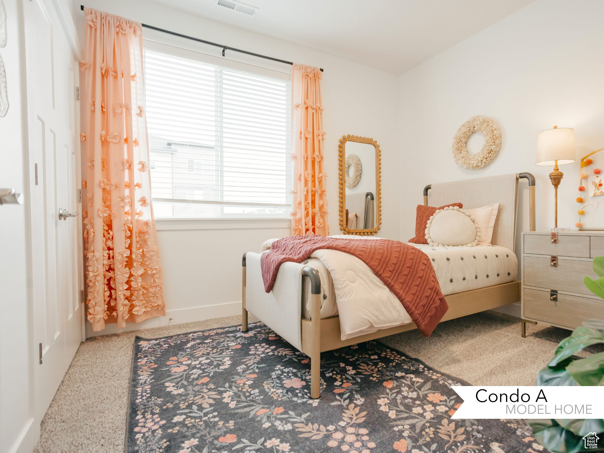 Bedroom with visible vents and baseboards