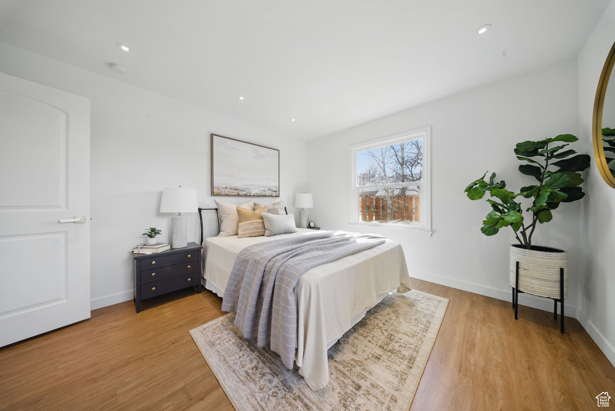 Bedroom with recessed lighting, baseboards, and light wood-style floors