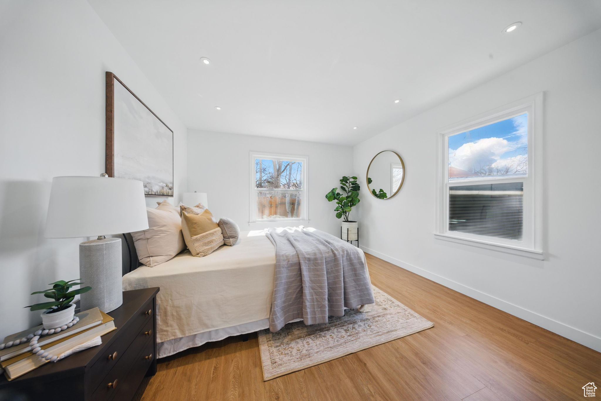 Bedroom featuring recessed lighting, baseboards, and light wood-style flooring