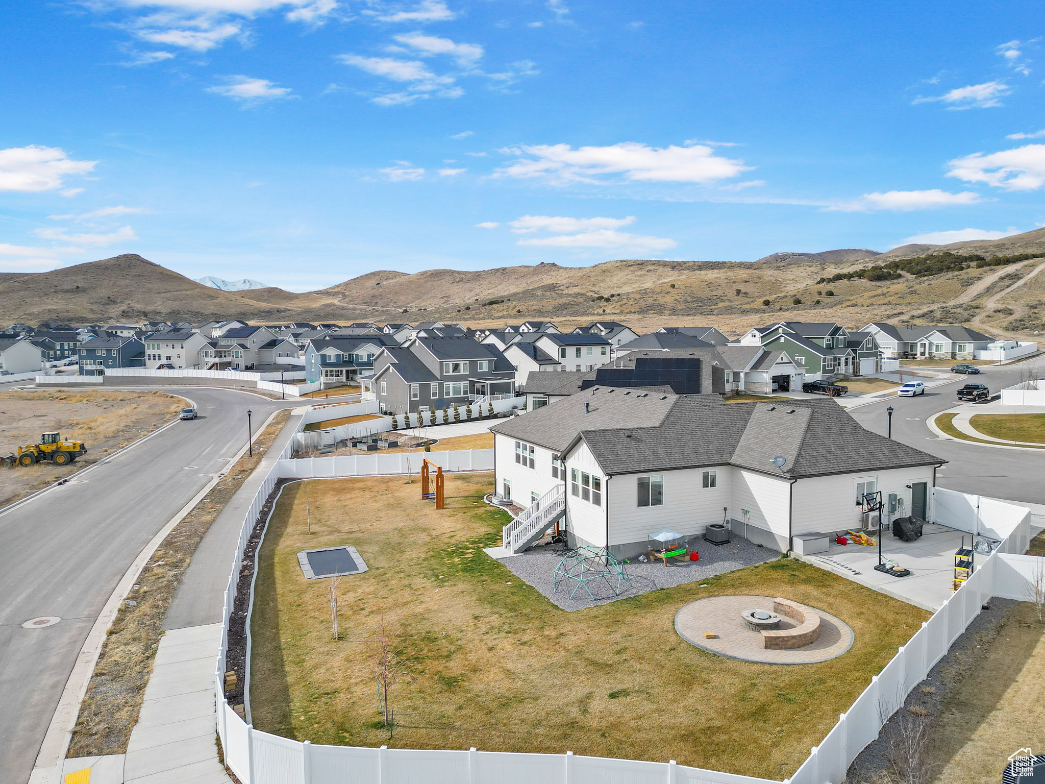 Birds eye view of property with a mountain view and a residential view