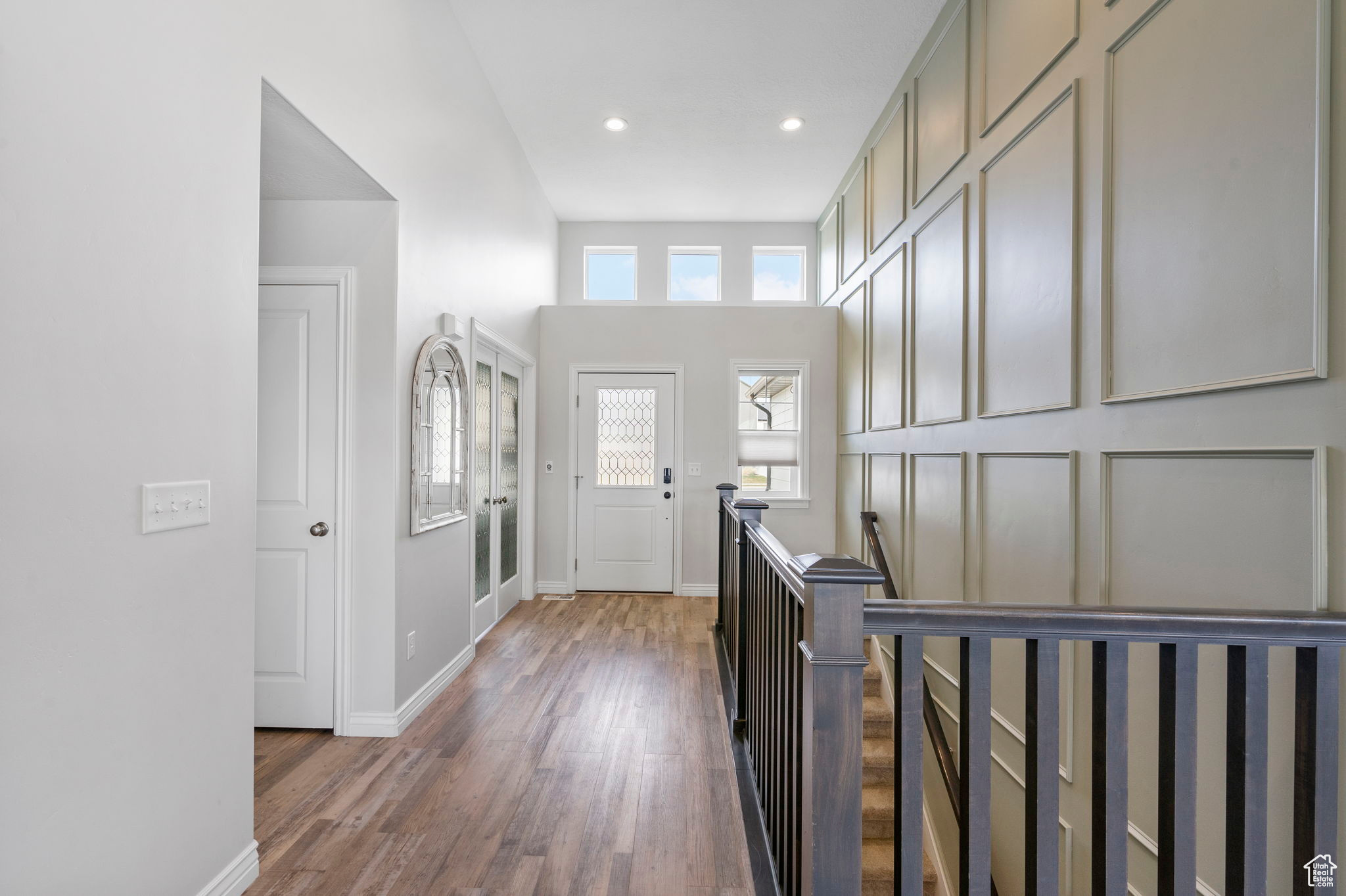 Foyer entrance featuring recessed lighting, baseboards, and wood finished floors