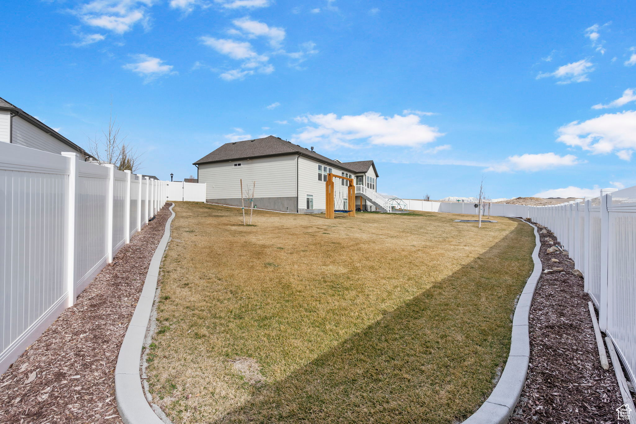 View of yard featuring a fenced backyard