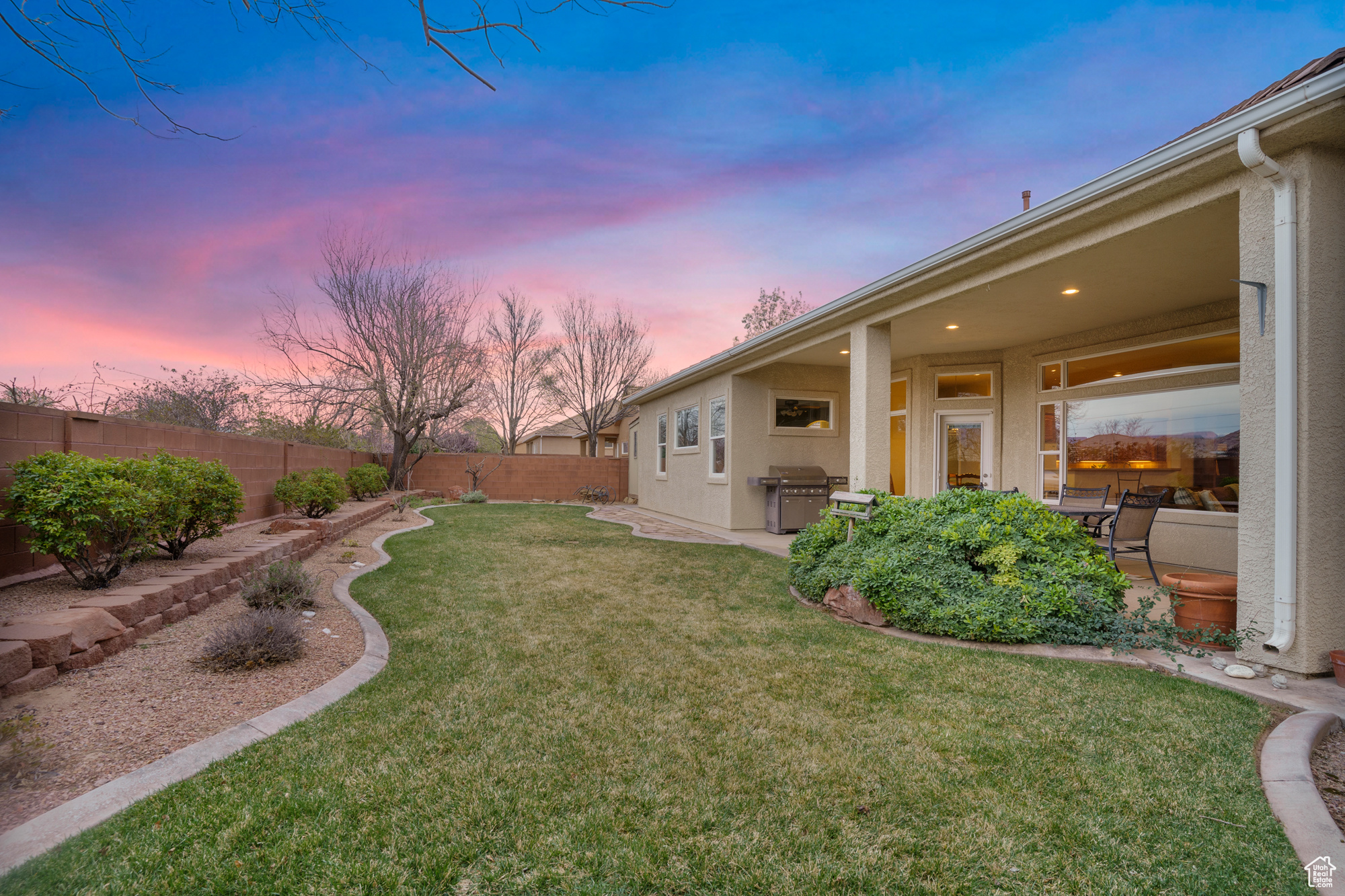 View of yard with a patio and a fenced backyard