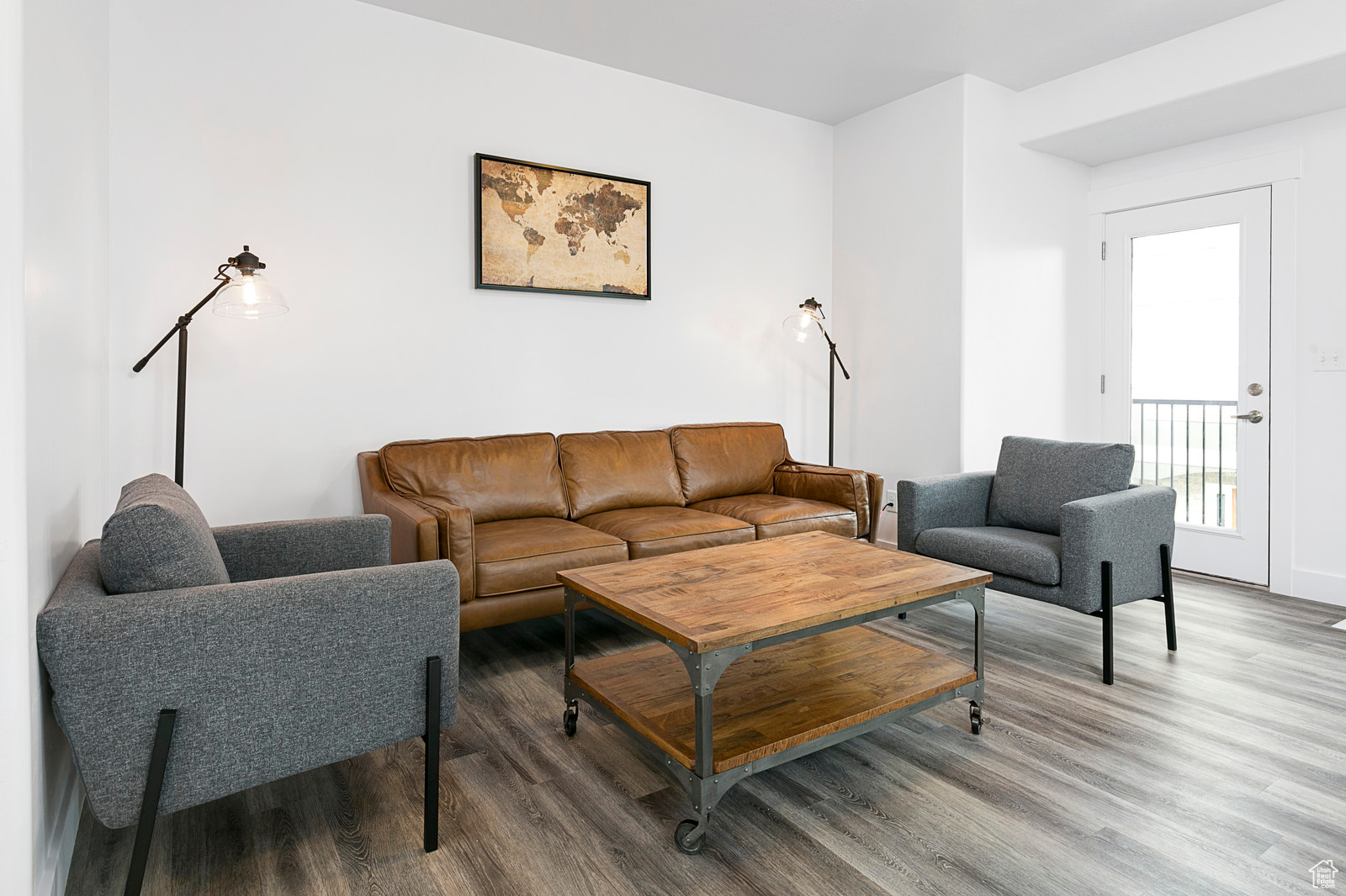 Living room featuring wood finished floors