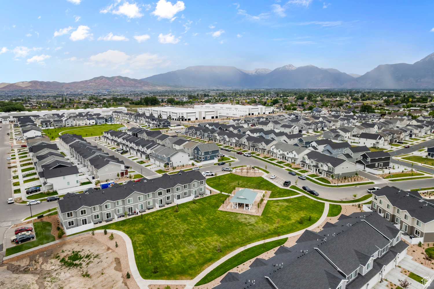 Birds eye view of property with a mountain view and a residential view