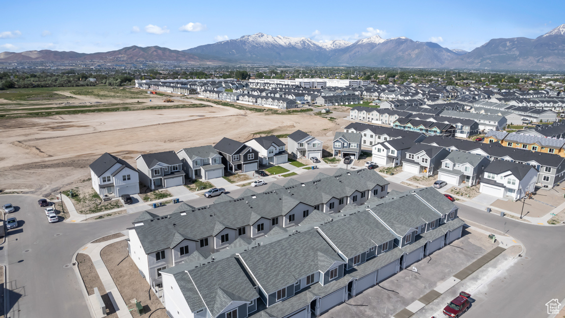 Birds eye view of property featuring a residential view and a mountain view