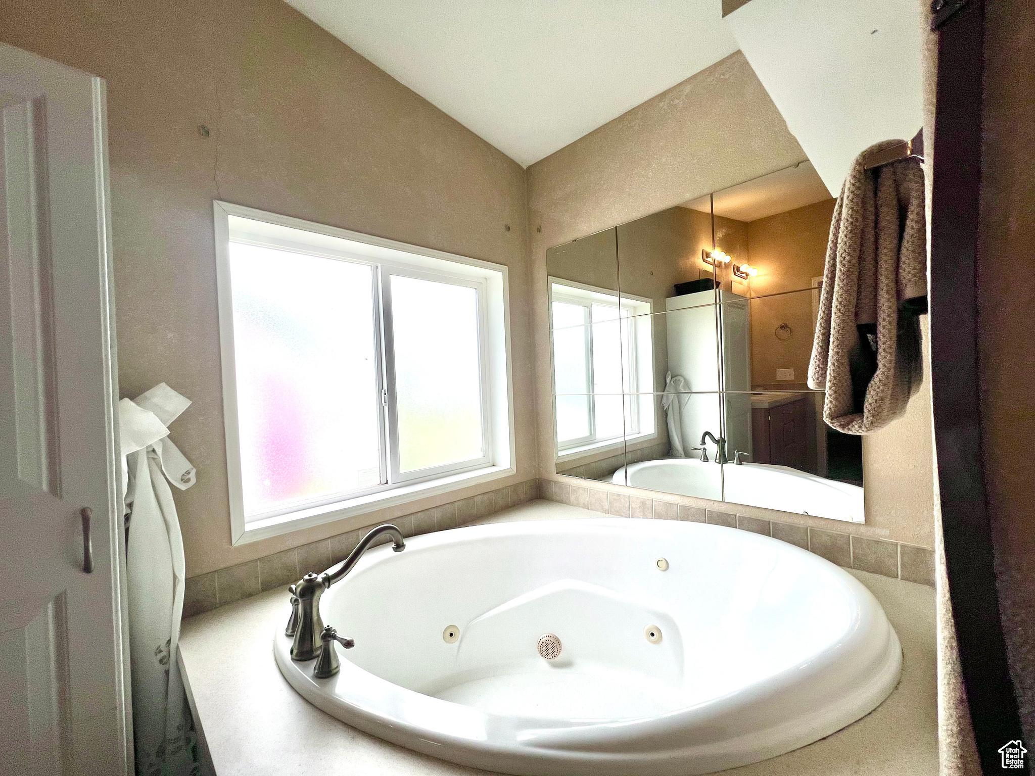 Bathroom featuring a whirlpool tub