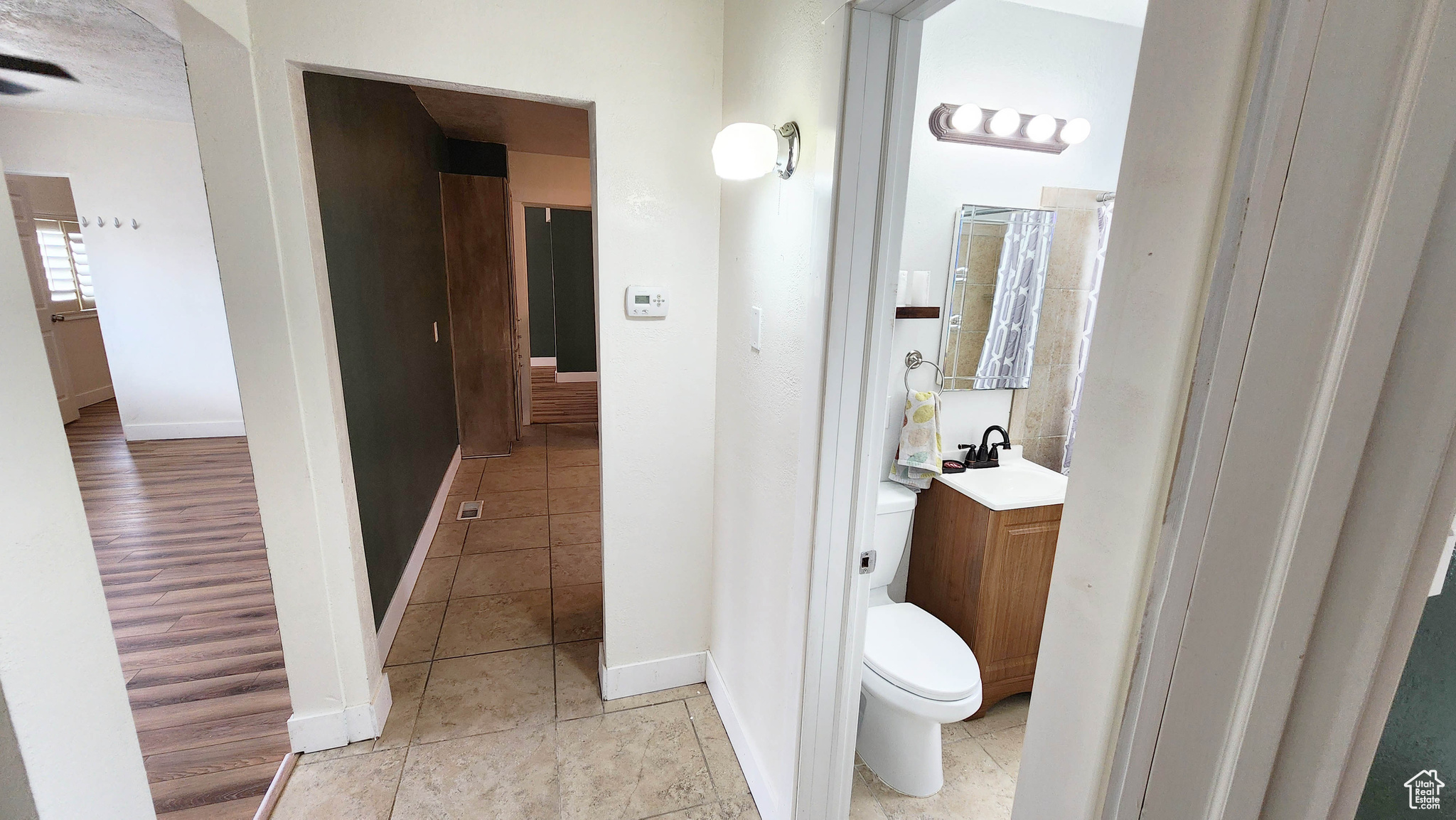 Right bath, middle kitchen, left living room.