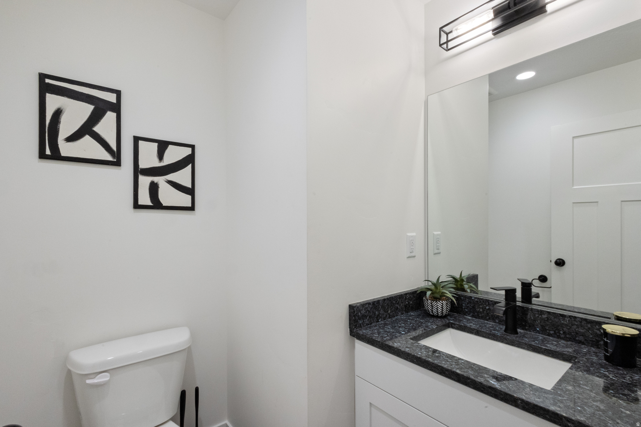 Bathroom with vanity and toilet
