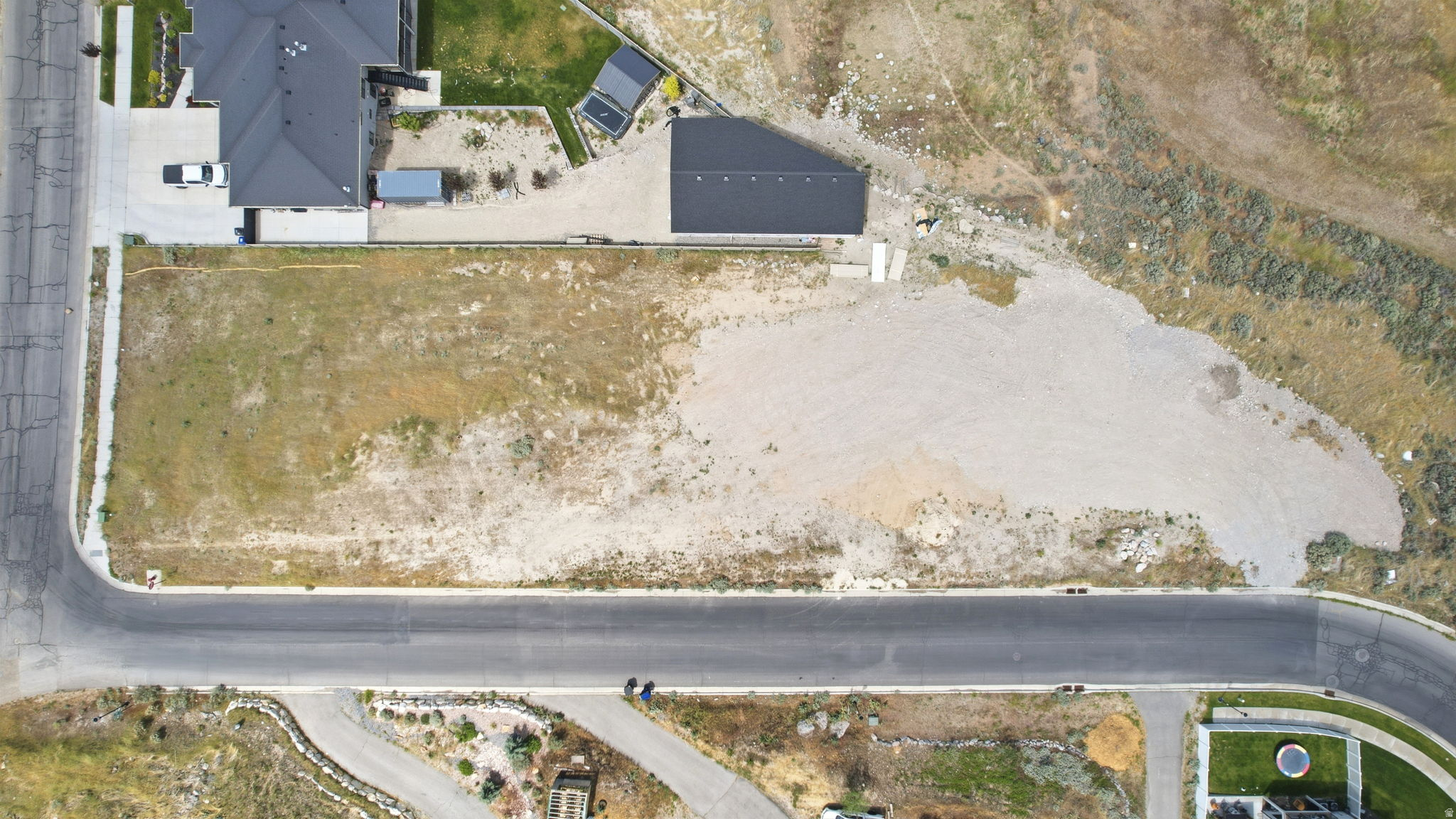 Expansive corner lot featuring direct road frontage