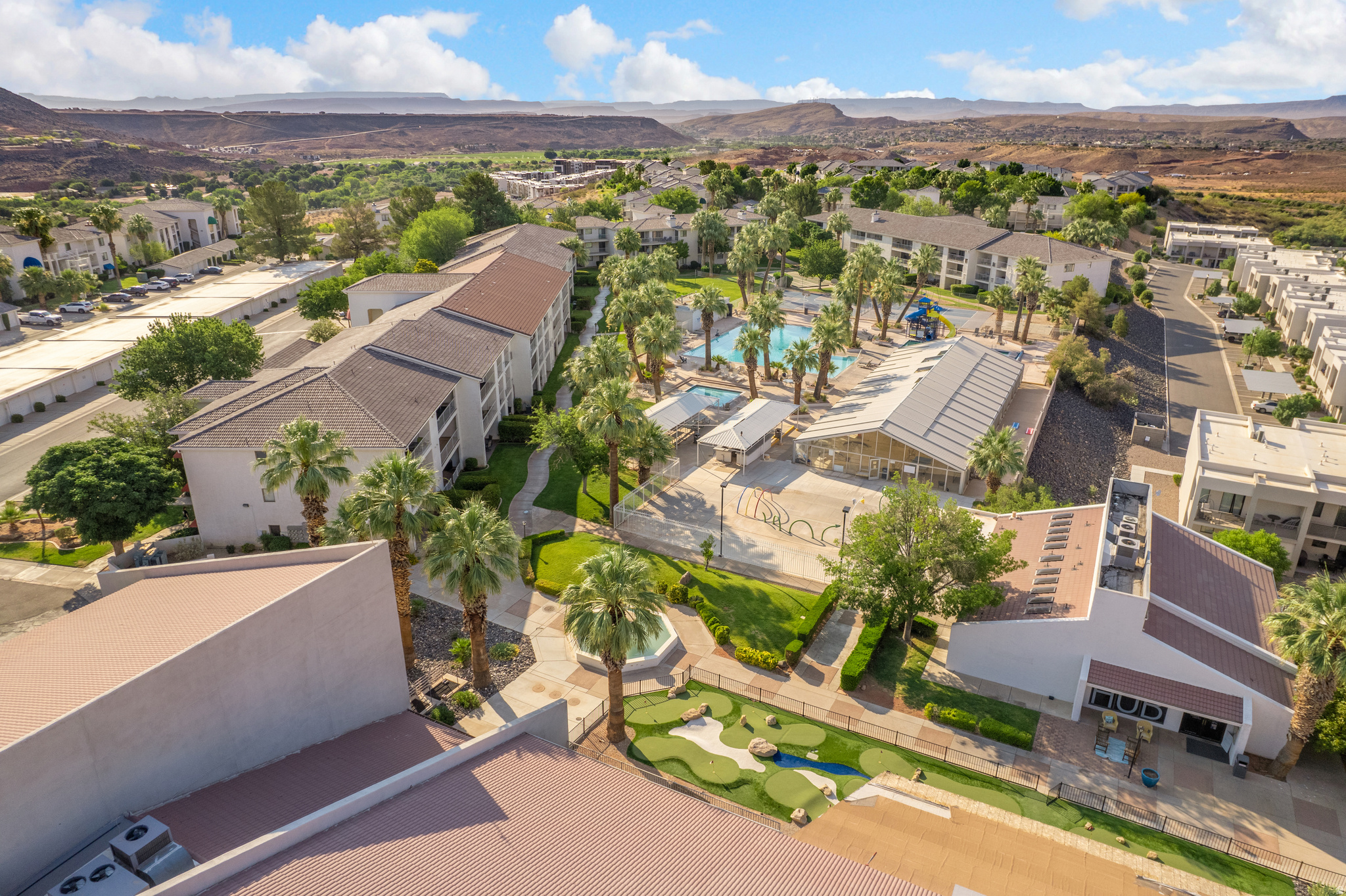 Aerial perspective showcasing a community with multiple residential buildings