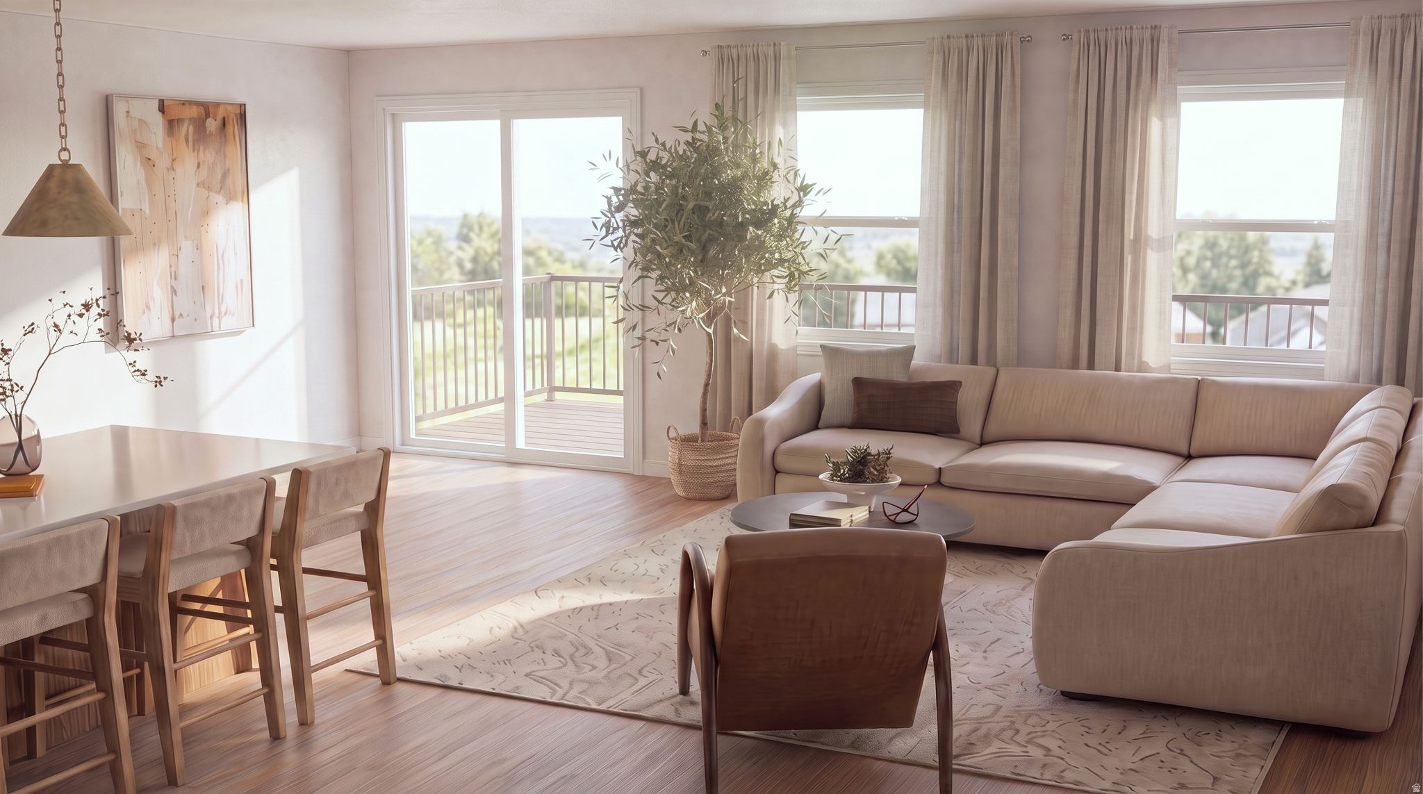Open-concept living area featuring wood-finish flooring, a patio door leading to an outdoor deck, and multiple windows providing natural illumination