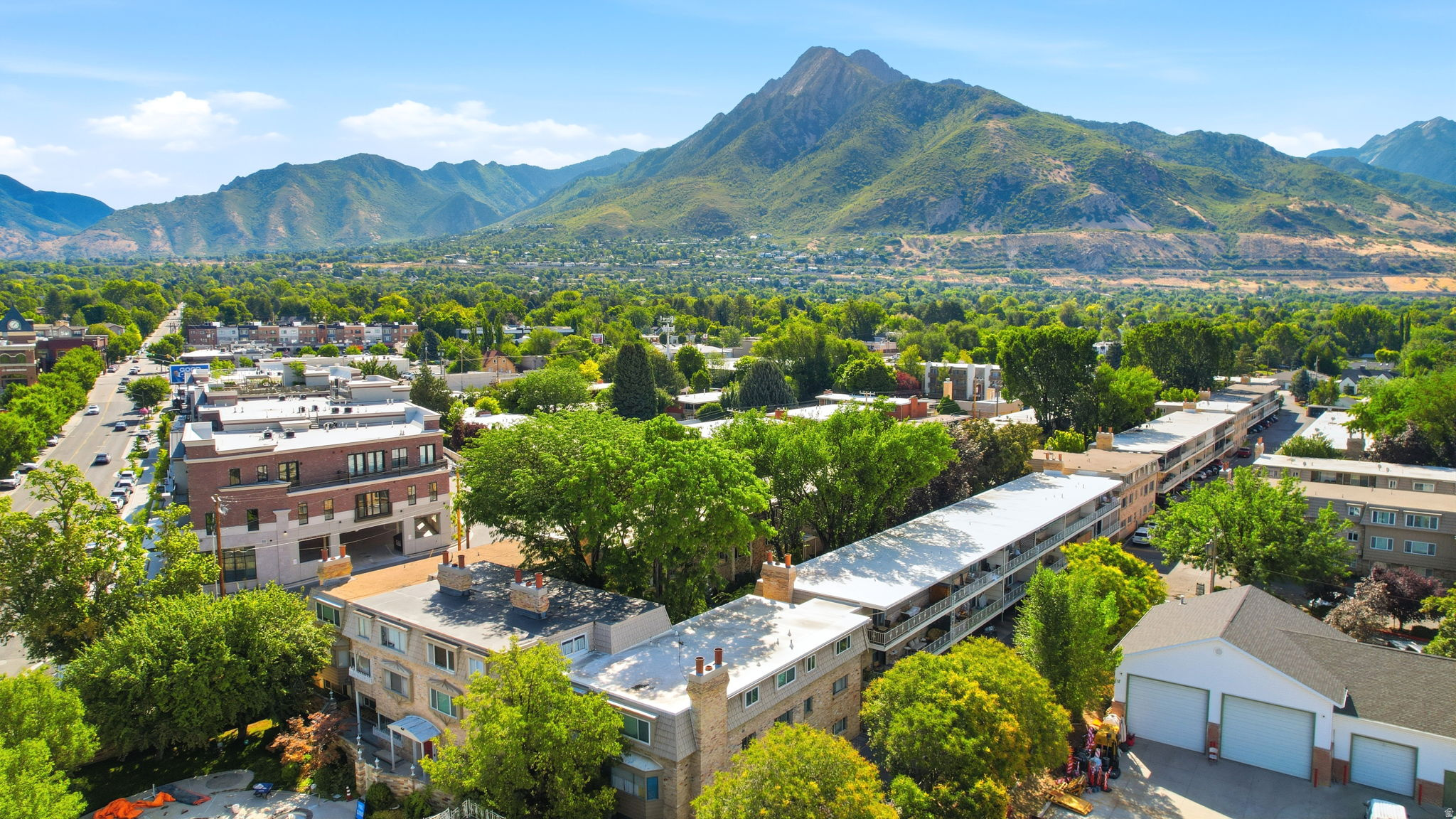 Urban landscape featuring a prominent mountain backdrop