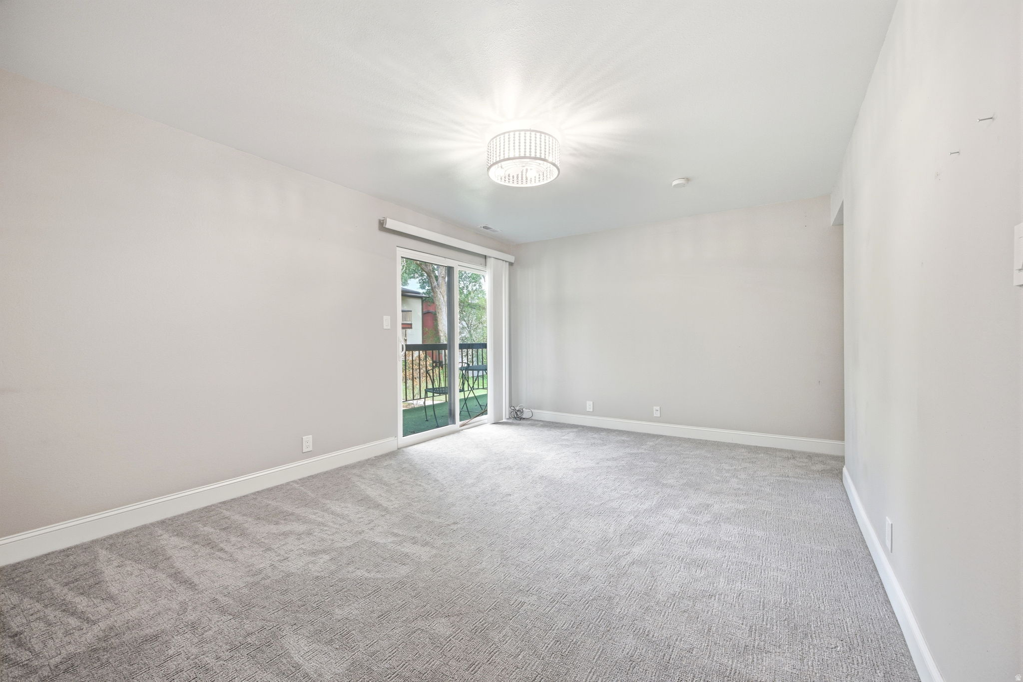 The bedroom has access to the patio.