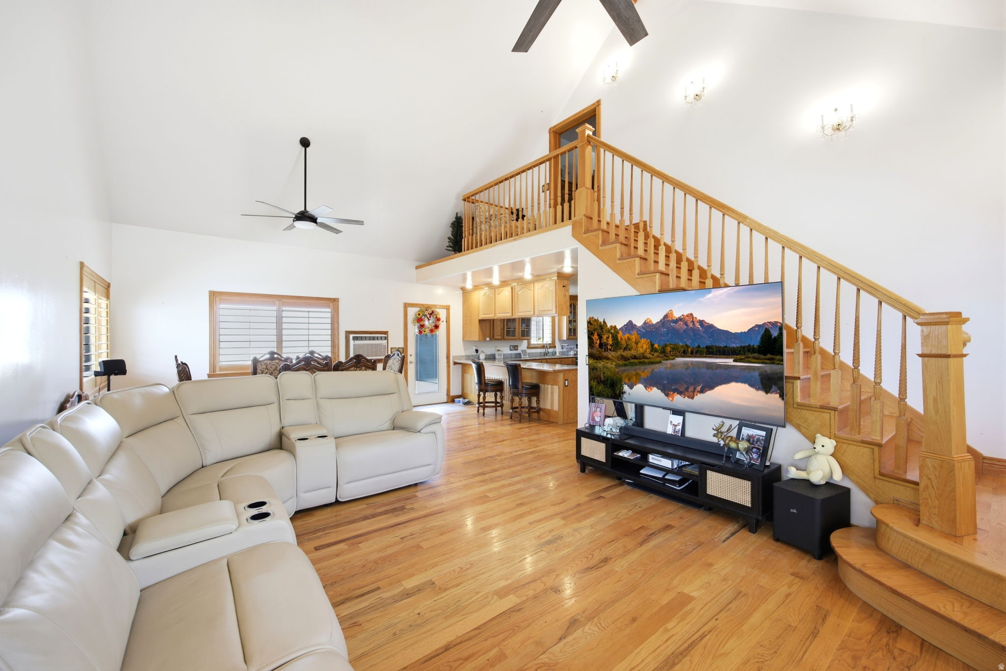 Main home - Vaulted ceiling living area with wood-finish flooring