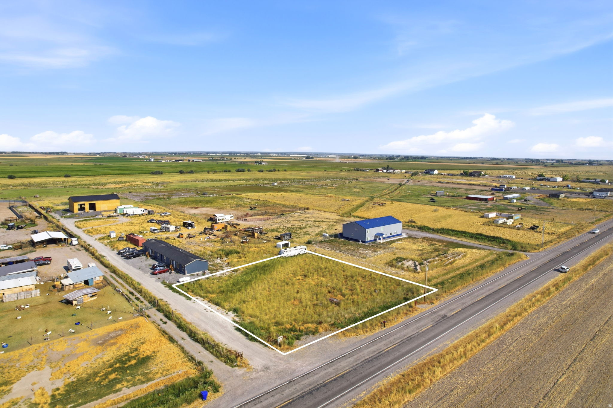 Expansive lot featuring a natural landscape and direct road frontage