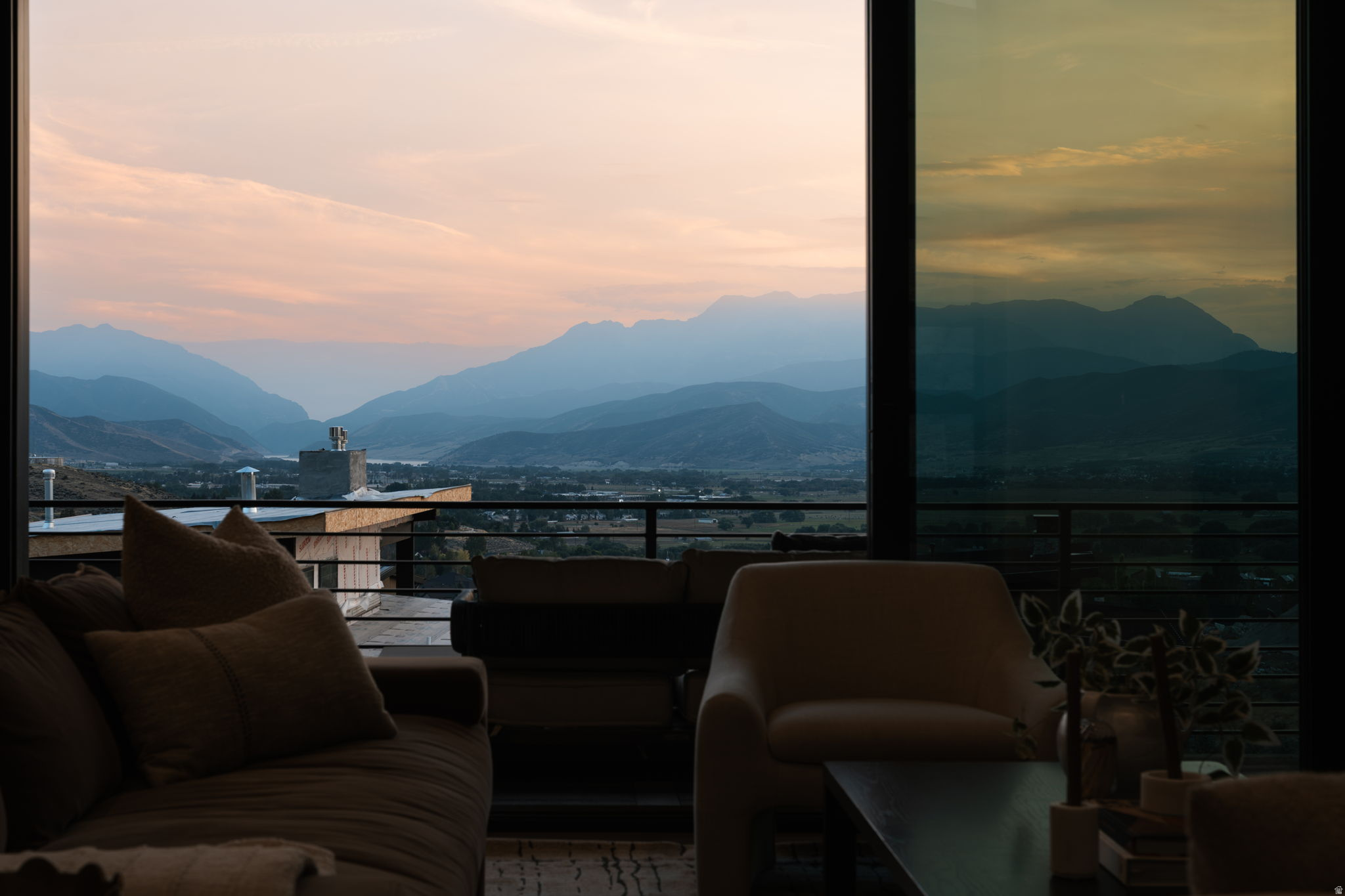 Expansive windows offering mountain scenery