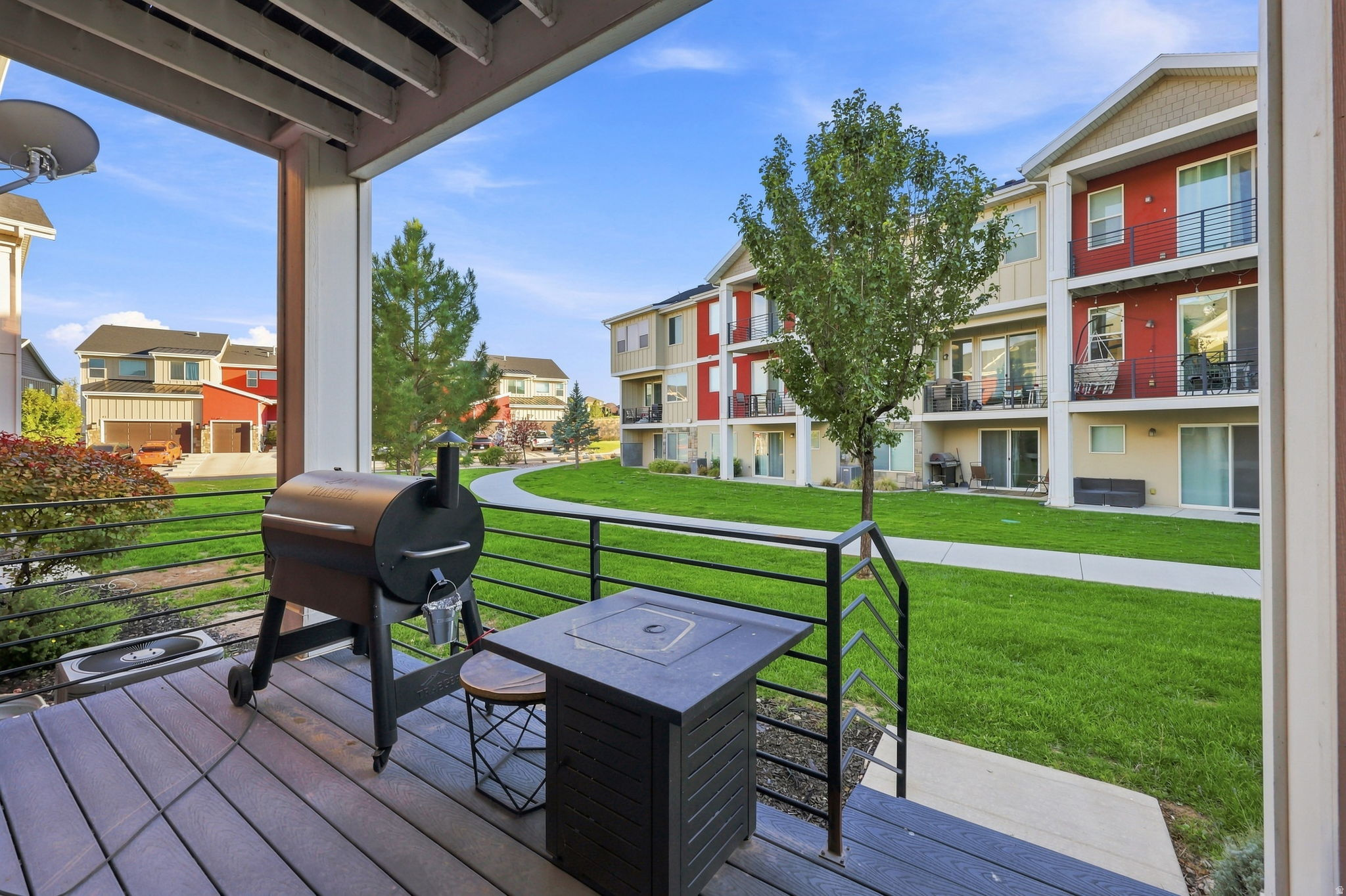 Ground-level patio with wood-finish decking