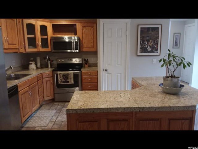 261 E Ashbrook Cir, Midvale, UT 84047 — photo 10