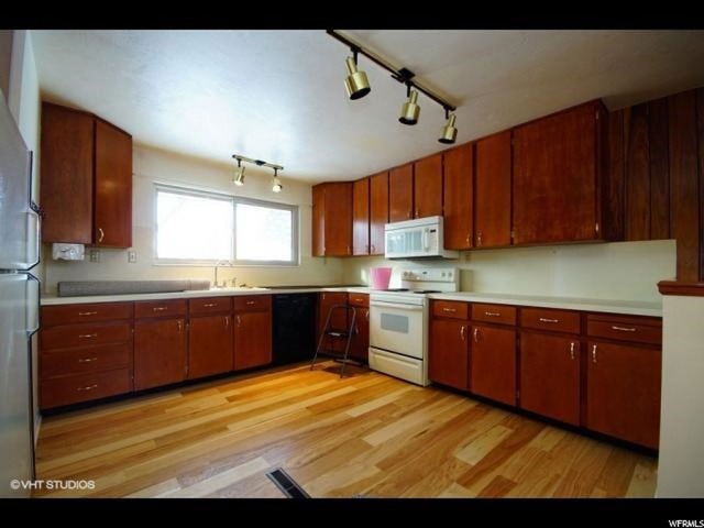 4770 S Meadowview Rd E, Murray, UT 84107 — photo 6