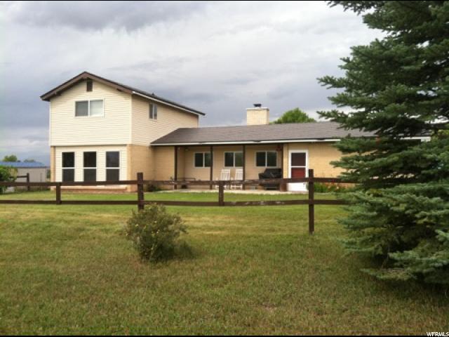 15440 7750 E N Spring City, Utah PRICE REDUCED!! Great family home! North of Historic Spring City, a very well maintained property, both home & land, with a great set up for horses, including an amazing new 54 FT X 60 FT metal barn. Many recent upgrades including remodeled master bedroom & bathroom, new stainless steel range & refrigerator, new hot water heater and more. Water Right of 1.48 acre feet and four shares of Horseshoe Irrigation included with purchase. Some furnishings are included with purchase. If you love horses you should see this amazing property. All info approx, buyer to verify.