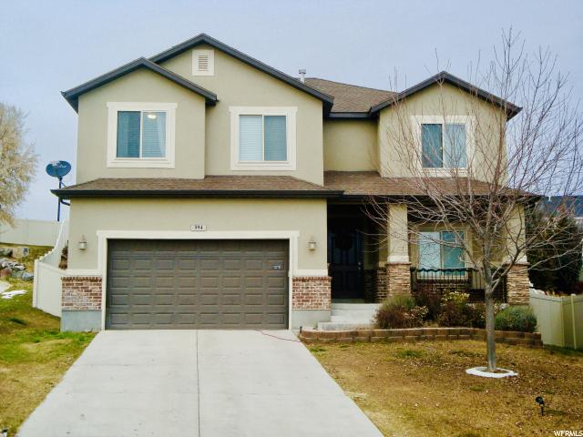 594 CRENSHAW CT W Saratoga Springs, Utah Great Harvest Hills Location! Amazing views from the front porch and the updated backyard. You will love the terraced garden space and back deck all summer. Spacious open floor plan, with 4 bedrooms upstairs. The home features granite countertops, tile floors, new walk-in master shower and surround, water softener, newer water heater. Home warranty included. Won't last long, must see! Square footage figures are provided as a courtesy estimate only and were obtained from the county records . Buyer is advised to obtain an independent measurement.