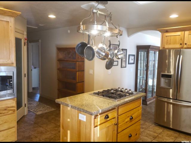 9810 W Point Lookout Dr, Bothwell, UT 84337 — photo 10