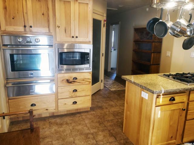 9810 W Point Lookout Dr, Bothwell, UT 84337 — photo 9