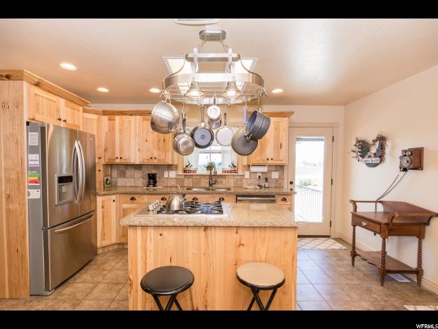 9810 W Point Lookout Dr, Bothwell, UT 84337 — photo 8