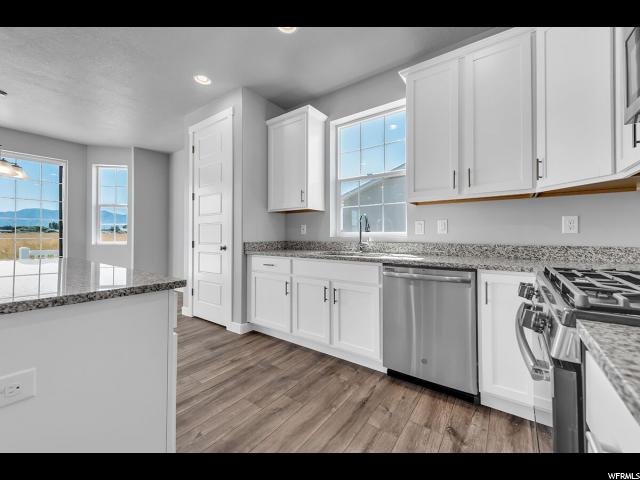 2452 N Sarus Crane Dr, Clinton, UT 84015 — photo 11