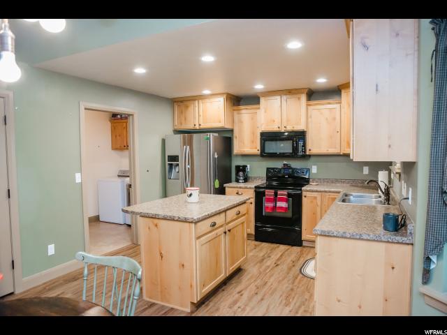 9740 W Point Lookout Dr, Bothwell, UT 84337 — photo 7