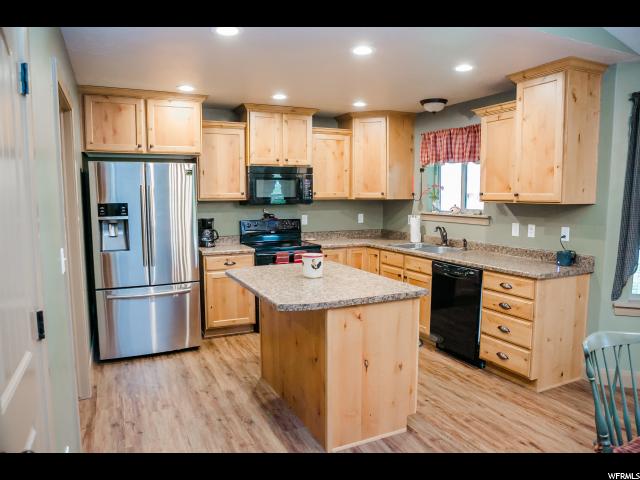 9740 W Point Lookout Dr, Bothwell, UT 84337 — photo 8