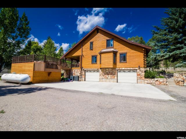 8293 W Red Cloud Loop Rd N, Vernal, UT 84078 — photo 4