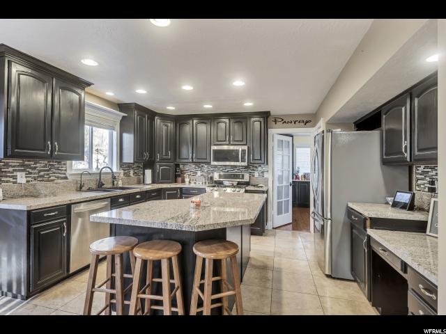 4836 N Pole Patch Dr, Pleasant View, UT 84414 — photo 9