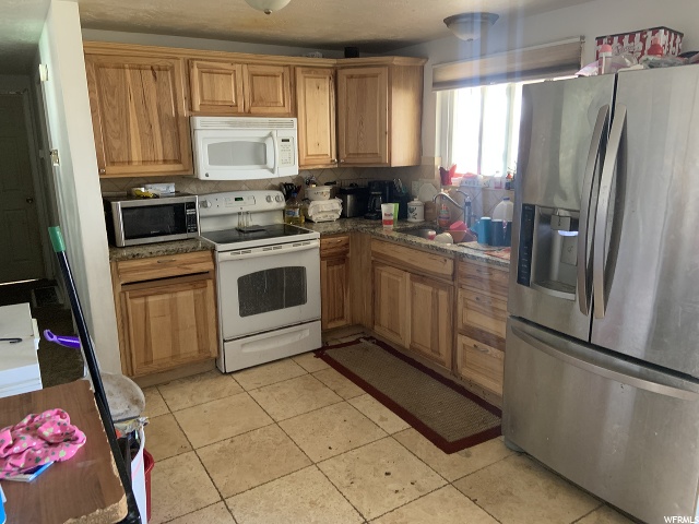 5891 S 2550 W, Roy, UT 84067 — photo 2