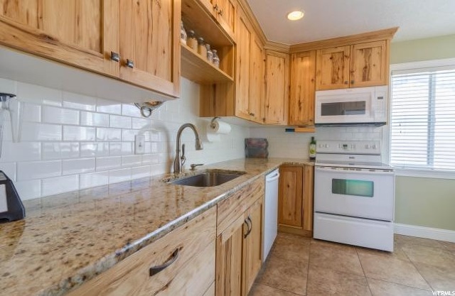 7401 S Halelani Dr, Midvale, UT 84047 — photo 9