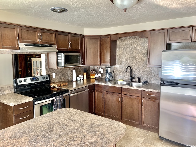 1442 N 300 W, Sunset, UT 84015 — photo 3