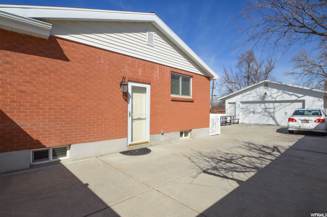 Side entry to Kitchen and Inside Basement Stairs