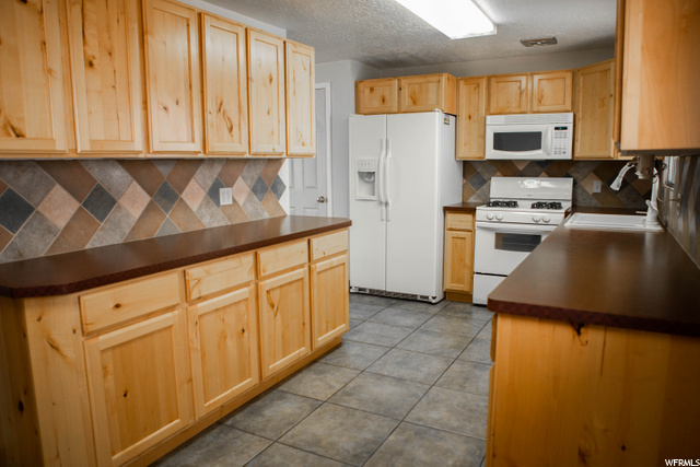 88 W 2400 N, Sunset, UT 84015 — photo 10