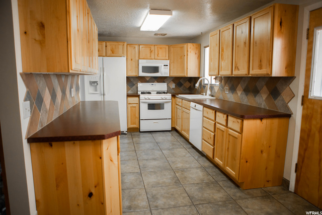 88 W 2400 N, Sunset, UT 84015 — photo 12