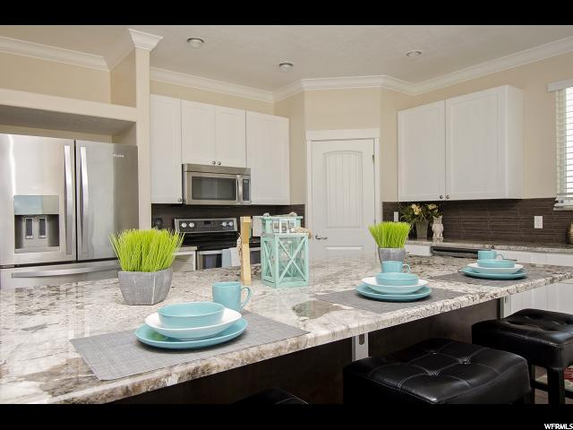 Main floor kitchen with 2 pantries