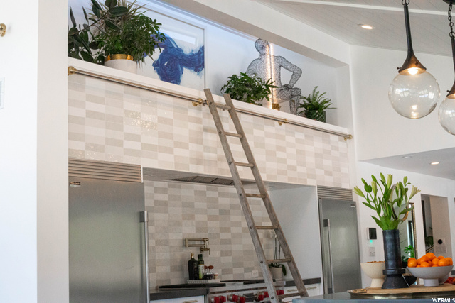 Library ladder to atrium inspired loft.